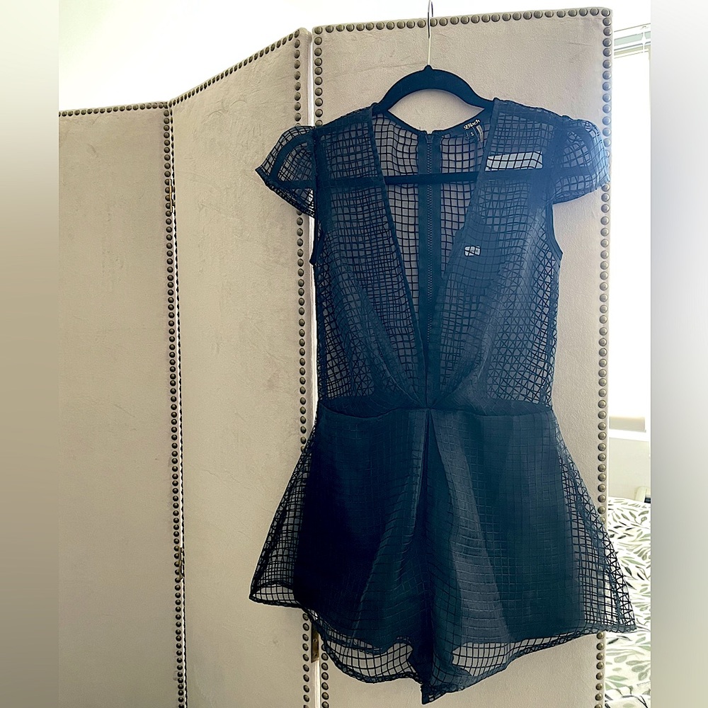 Black fishnet style romper NWT